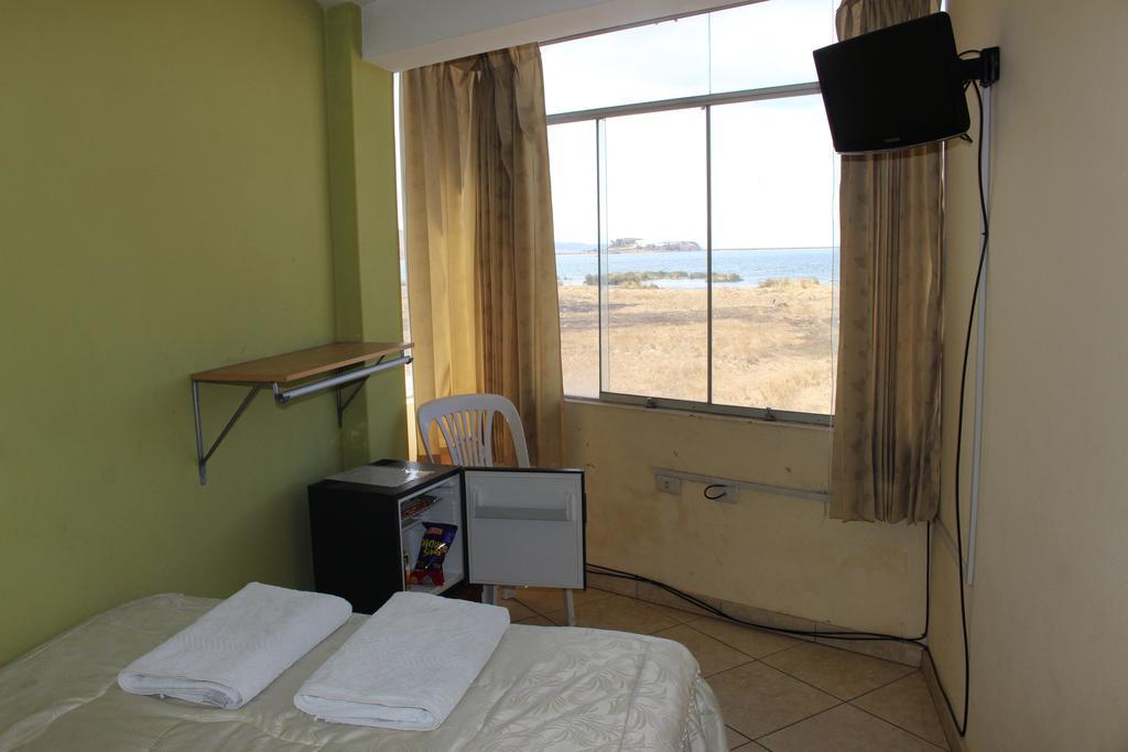 פונו Posada De Percybal Lago Inn מראה חיצוני תמונה