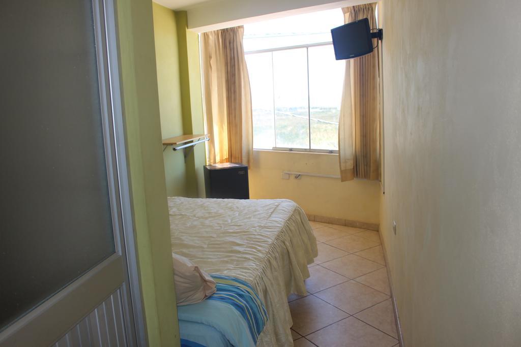 פונו Posada De Percybal Lago Inn מראה חיצוני תמונה