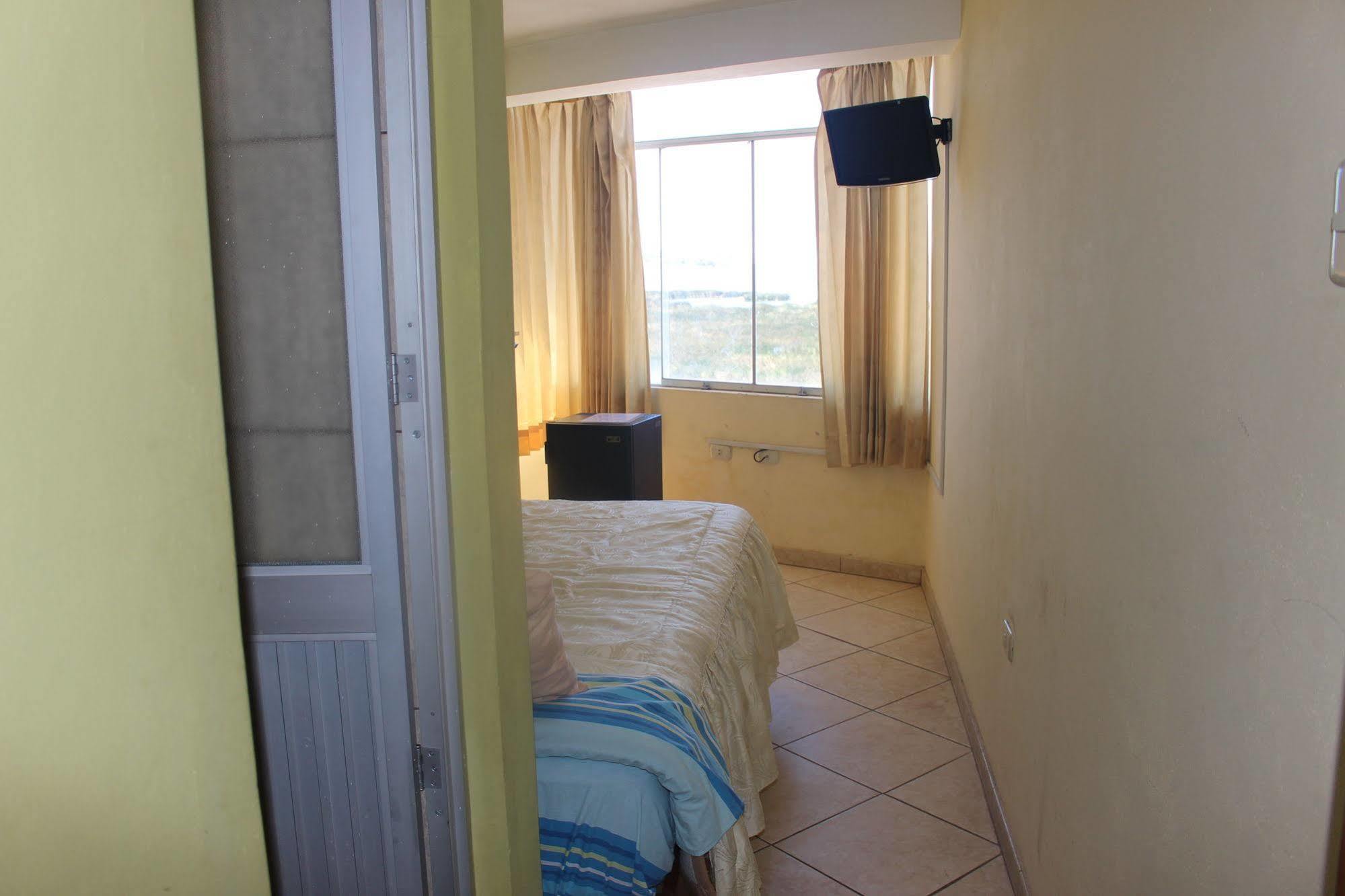 פונו Posada De Percybal Lago Inn מראה חיצוני תמונה